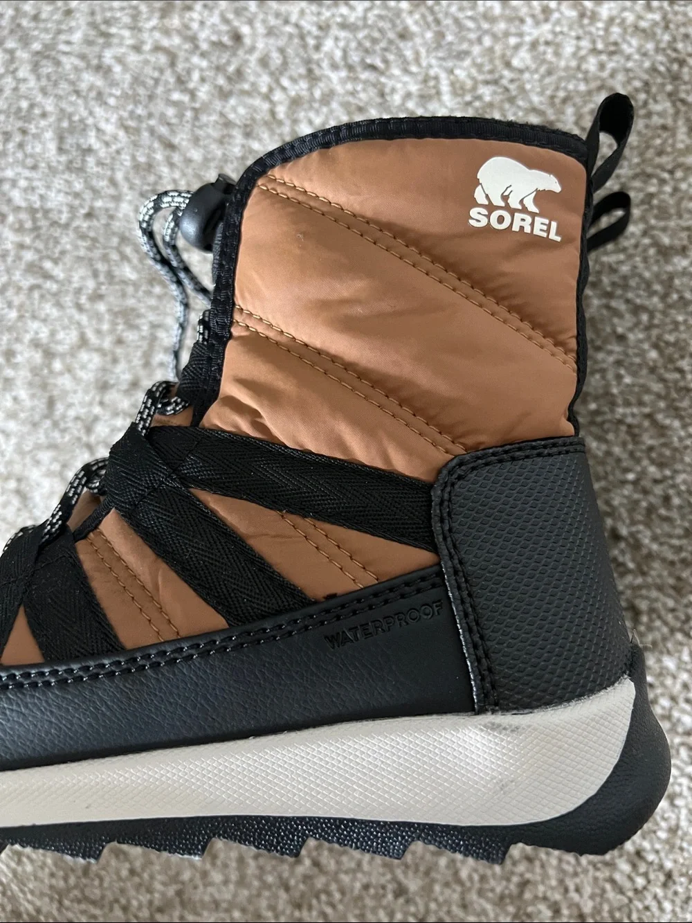 Sorel Tan and Black Insulated Winter Boots